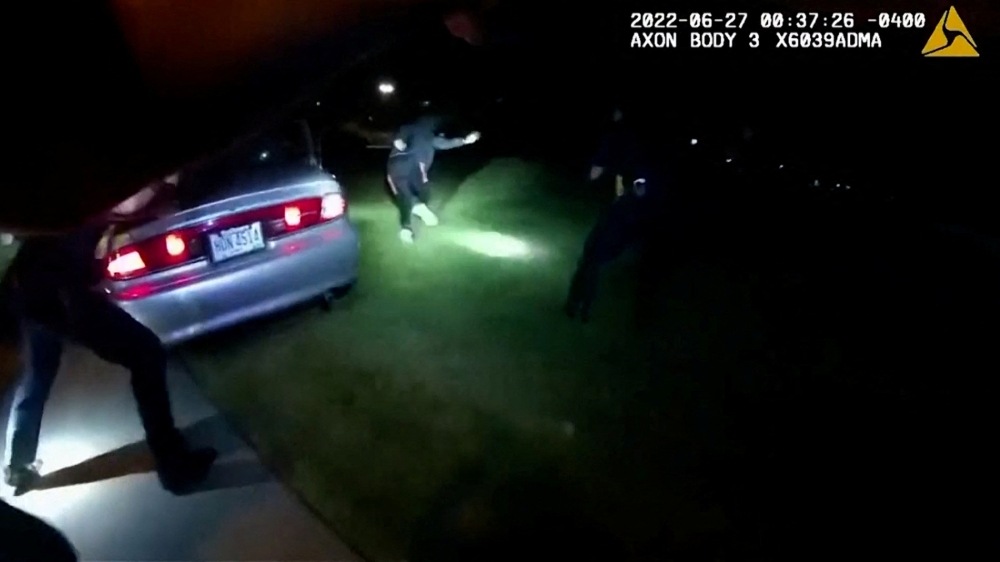 Black man Jayland Walker exits his vehicle and runs before he was shot to death by up to eight officers, in Akron, Ohio, U.S. June 25, 2022 in a still image from police body camera video. City of Akron/Handout via REUTERS.
