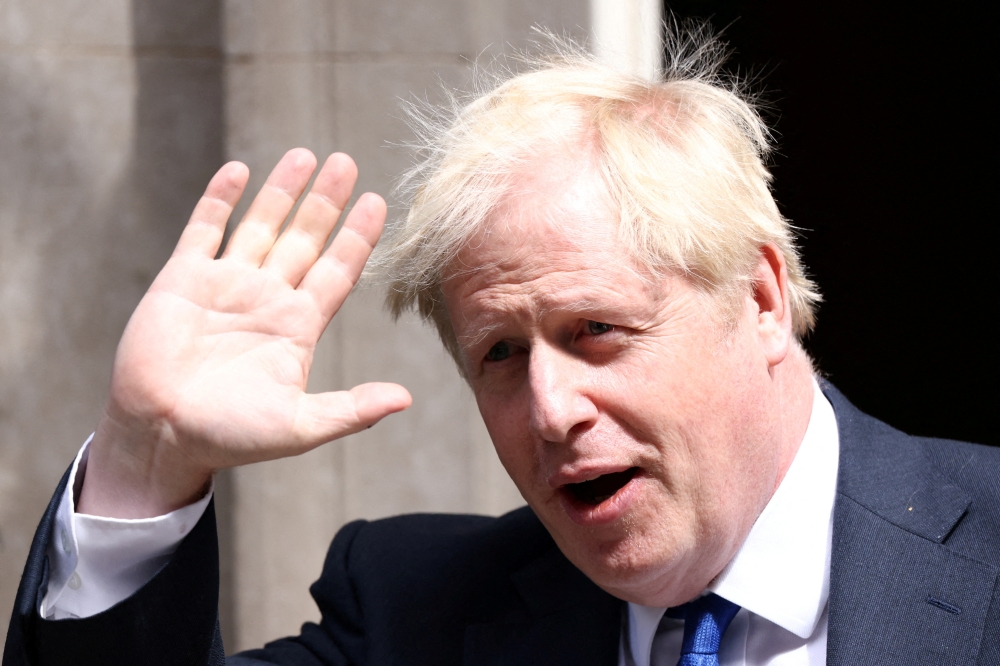 British Prime Minister Boris Johnson walks at Downing Street in London, Britain, July 6, 2022. (Reuters)