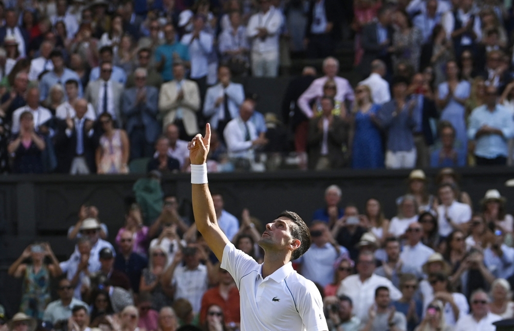 Serbia's Novak Djokovic celebrates winning his semi final match against Britain's Cameron Norrie (Reuters/Toby Melville)