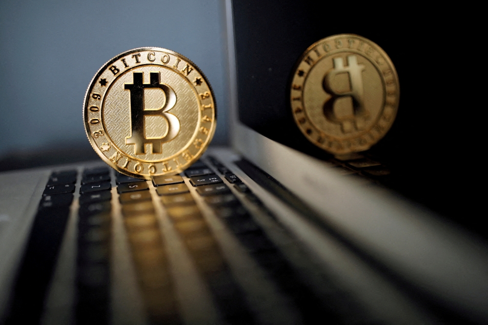 A bitcoin representation. (REUTERS/Benoit Tessier/File Photo)