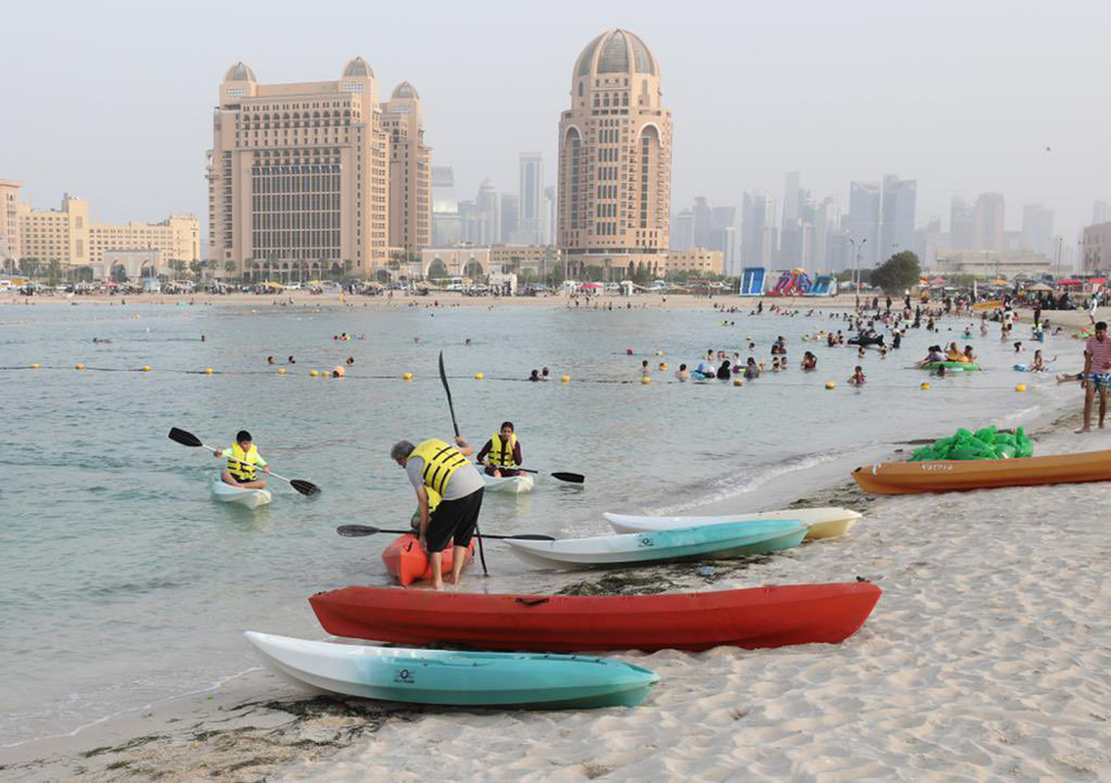 People take part in water sports at Katara beach on the second day of Eid Al Adha yesterday. 