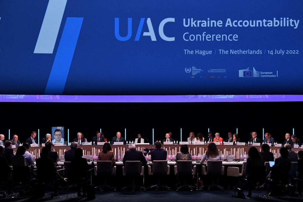 War crimes prosecutors and top European judicial authorities meet to coordinate efforts to investigate and put on trial alleged perpetrators of atrocities since Russia's invasion of Ukraine, at the Ukraine Accountability Conference in The Hague, Netherlands, July 14, 2022. REUTERS/Piroschka van de Wouw