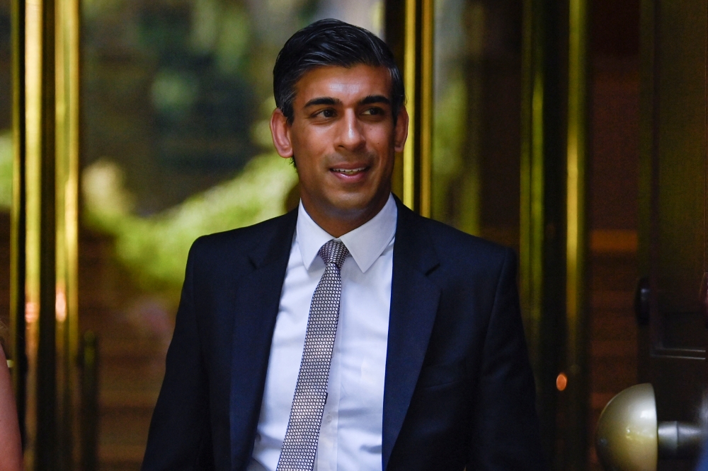 Former Chancellor of the Exchequer Rishi Sunak walks in London, Britain, July 14, 2022. REUTERS/Toby Melville