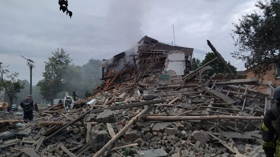 Emergency crew work amidst collapsed building site in Chuhuiv Town, Kharkiv, Ukraine, in this handout image obtained by REUTERS on July 16, 2022. State Emergency Service of Ukraine/Handout via REUTERS


