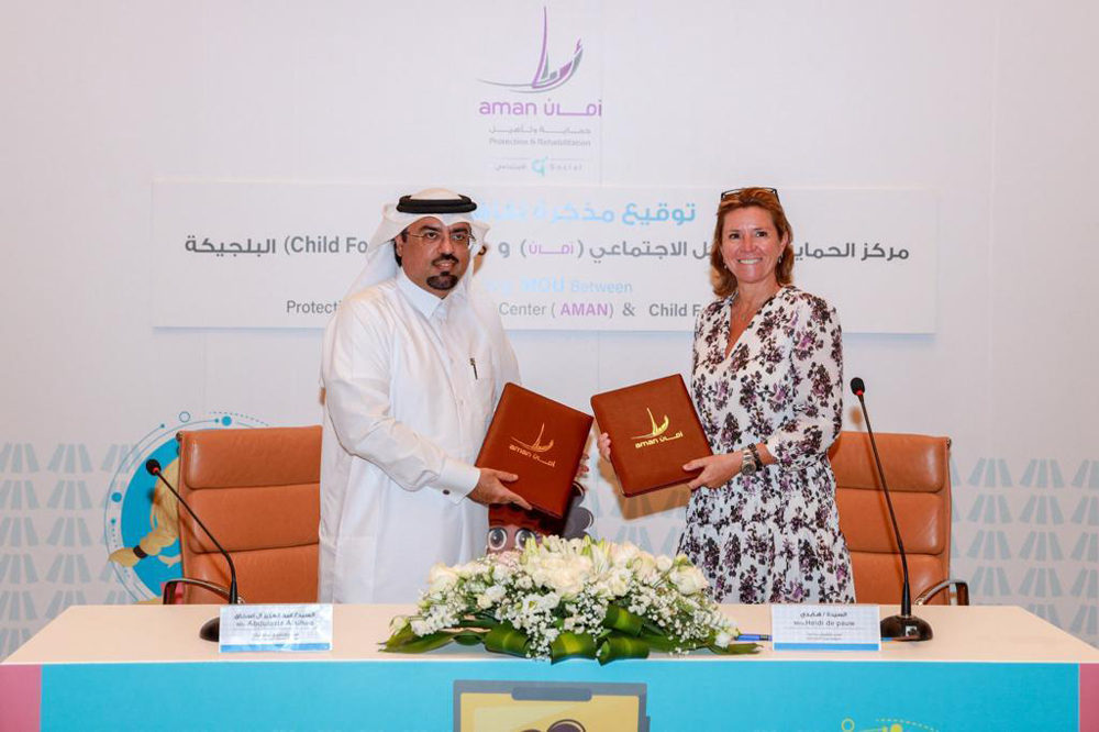 Executive Director of Aman Centre Abdulaziz Al Ishaq and CEO of Child Focus Heidi De Pauw during the signing of the agreement. 
