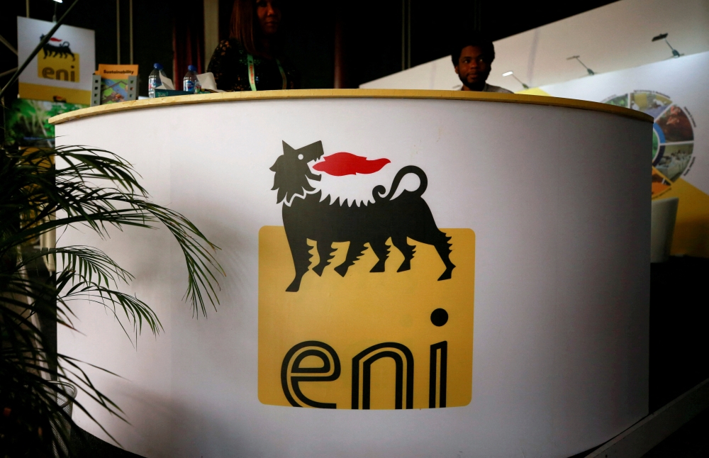 The logo of Italian energy company Eni is seen on a booth stand during the Nigeria International Petroleum Summit in Abuja, Nigeria, on February 11, 2020. (Reuters)