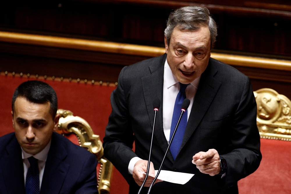 Italian Prime Minister Mario Draghi speaks to the Senate ahead of a confidence vote for the government after he tendered his resignation last week in the wake of a mutiny by a coalition partner, in Rome, Italy July 20, 2022. (REUTERS/Guglielmo Mangiapane)