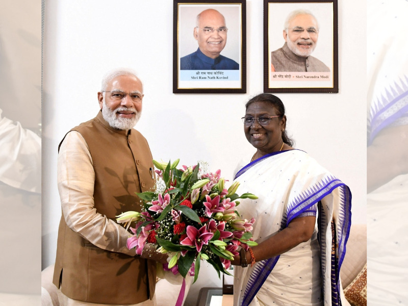 India's Prime Minister Narendra Modi congratulates Droupadi Murmu after she was elected as the country's first president from the tribal community, in New Delhi, India, July 21, 2022. (Reuters) 