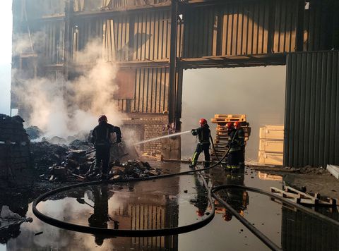 Emergency crew work at a damaged building, as Russia's invasion of Ukraine continues, in Odesa, Ukraine, in this handout image released on July 16, 2022. State Emergency Services of Ukraine/Handout via REUTERS