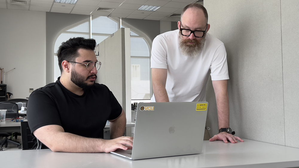 Abdulrahman Alkhatib (left) with Levi Hammet, Associate Professor-Graphic Design, VCUarts Qatar.