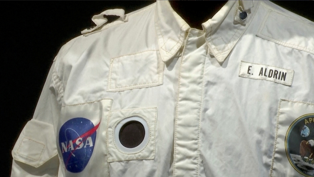 A view of a detail of Buzz Aldrin's flown inflight coverall jacket, worn by him on his mission to the Moon and back during Apollo 11, that was sold for $2,772,500 at Sotheby's, in New York City, U.S. July 21, 2022 in this screengrab from a video. Reuters TV via REUTERS