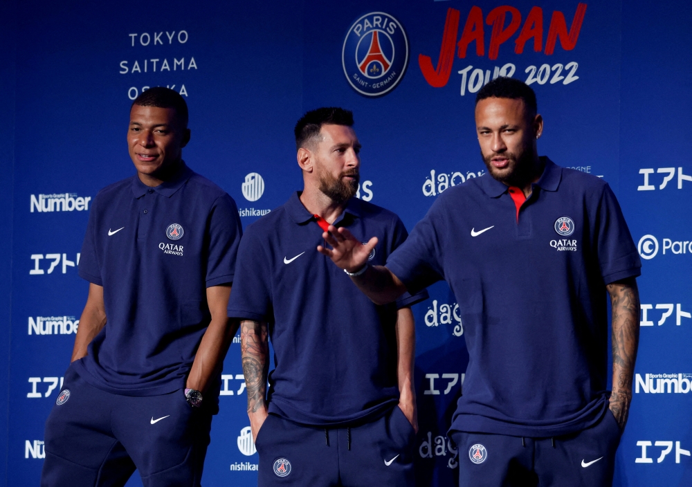Paris St Germain's Lionel Messi, Neymar and Kylian Mbappe attend a news conference upon arrival in Tokyo for their team's tour of Japan in Tokyo, Japan July 17, 2022. Reuters/Issei Kato/File Photo