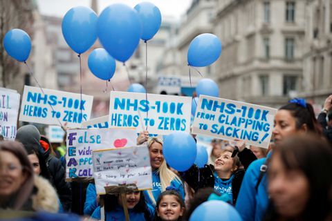 NHS staff march in a protest against the coronavirus disease (COVID-19) vaccine rules, in London, Britain, January 22, 2022. REUTERS/Peter Nicholls 