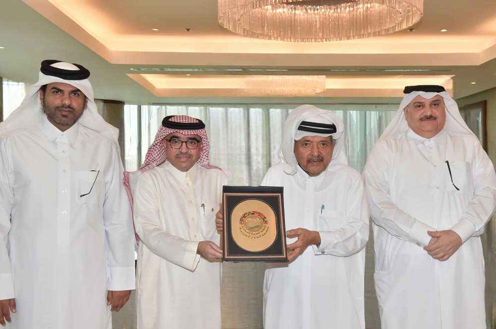 Chairman of Qatar Hotels Association Sheikh Faisal bin Qassim Al Thani with President of the Arab Tourism Organisation Dr. Bandar bin Fahd Al Fahid and other officials during a meeting.
