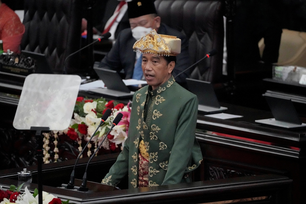 Indonesian President Joko Widodo delivers his State of the Nation Address ahead of the country's Independence Day at the parliament building in Jakarta, Indonesia, August 16, 2022. Tatan Syuflana/Pool via REUTERS/Pool via REUTERS