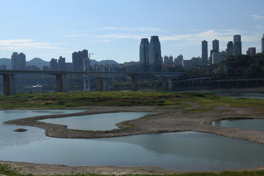 A view of the exposed riverbed of Yangtze river on a hot day in Chongqing, China August 17, 2022. cnsphoto via REUTERS