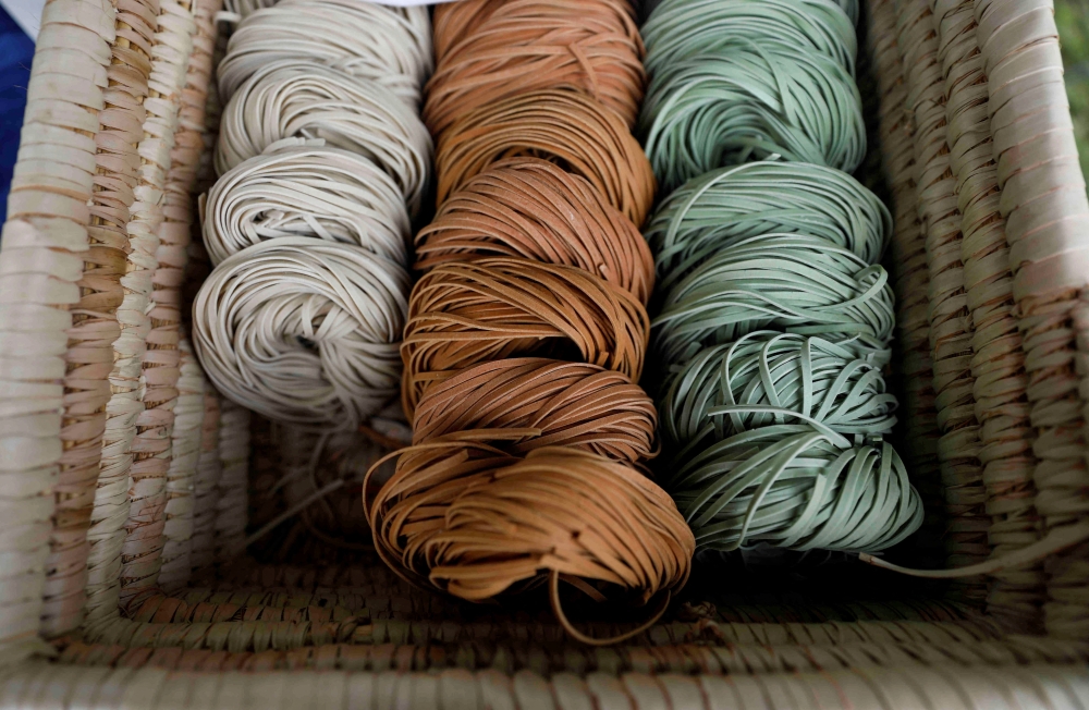 Gluten free pasta products of Aldente Africa are seen in a rattan basket during a weekly farmers' market in Ikoyi, Lagos, Nigeria June 25, 2022. REUTERS/Temilade Adelaja