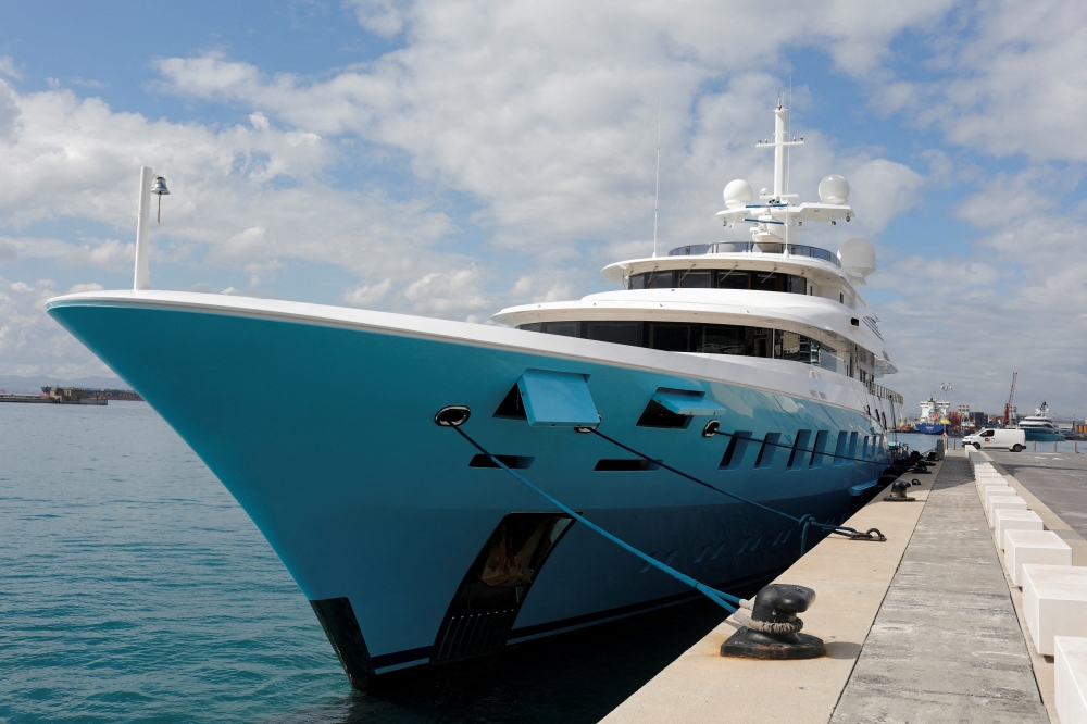The Axioma superyacht belonging to Russian oligarch Dmitrievich Pumpyansky who is on the EU's list of sanctioned Russians is seen docked at a port, amid Russia's invasion of Ukraine, in Gibraltar, on March 21, 2022. Reuters