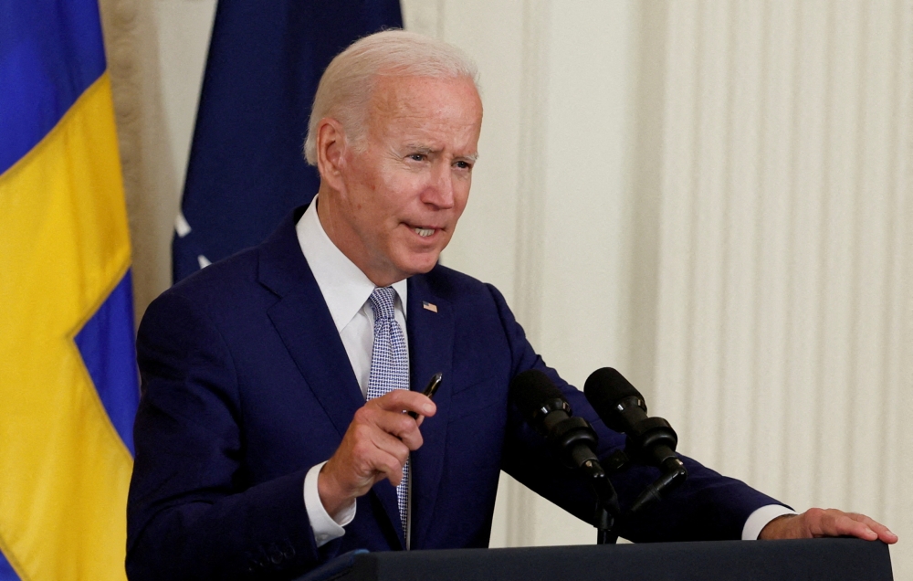 FILE PHOTO: U.S. President Joe Biden in the East Room of the White House, in Washington, U.S., August 9, 2022. REUTERS/Evelyn Hockstein