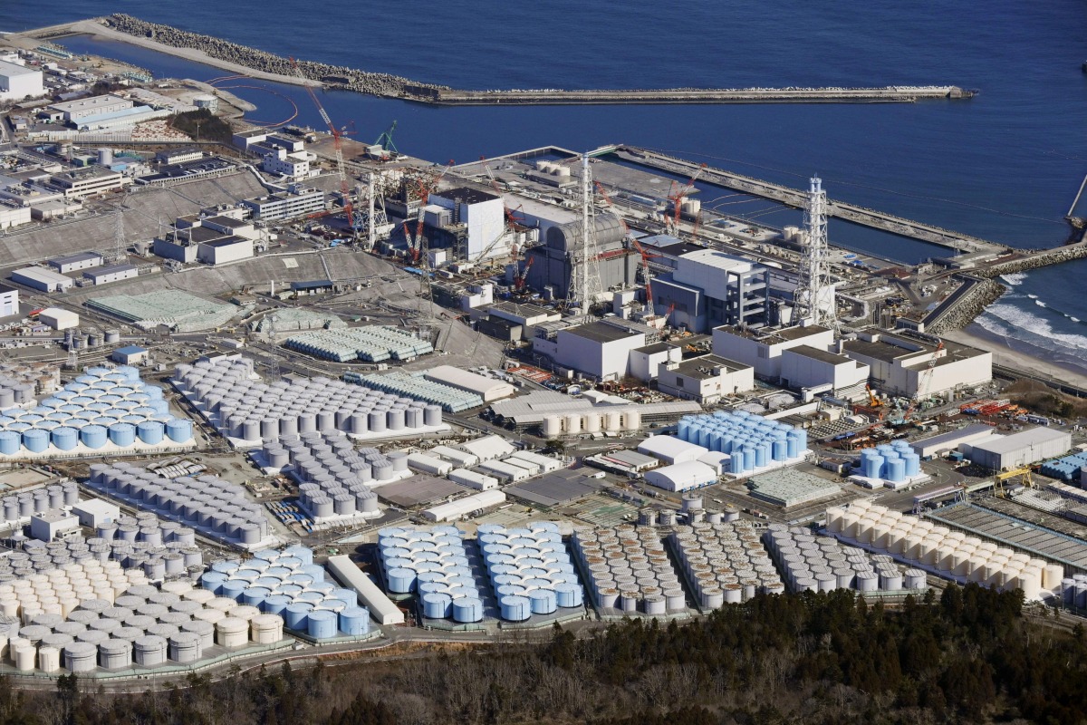 An aerial view shows the storage tanks for treated water at the tsunami-crippled Fukushima Daiichi nuclear power plant in Okuma town, Fukushima prefecture, Japan, on February 13, 2021.  File Photo / Reuters