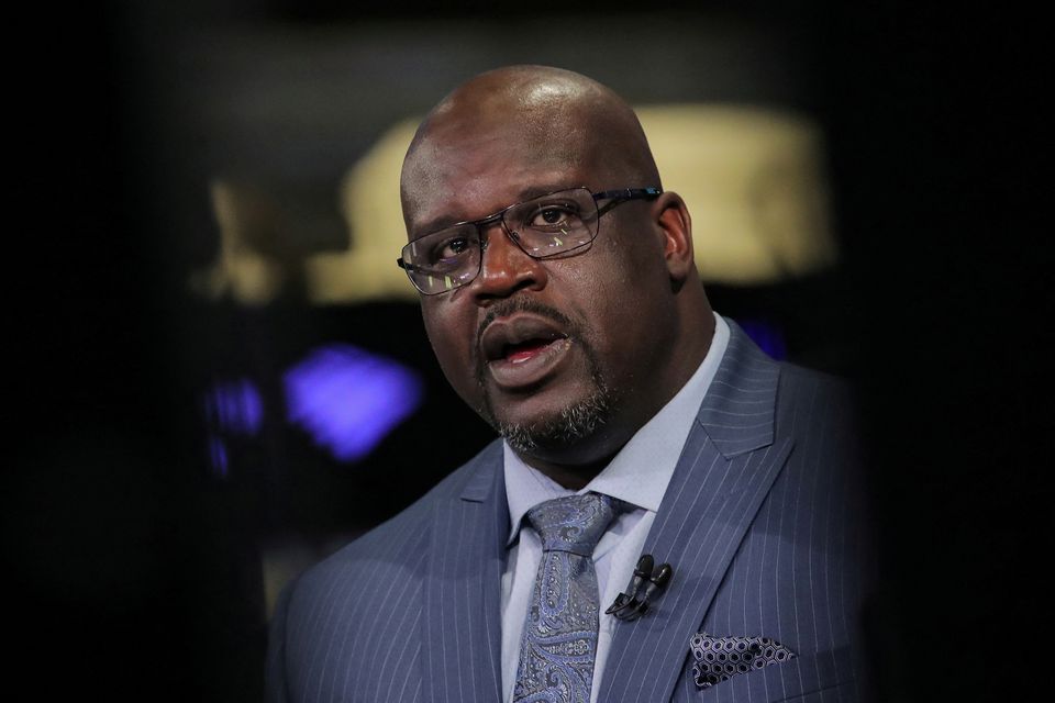 Former basketball star Shaquille O'Neal, speaks during an interview on CNBC about joining the board of Papa John’s International Inc., on the floor of the New York Stock Exchange (NYSE) in New York, U.S., March 22, 2019. REUTERS/Brendan McDermid/File Photo

