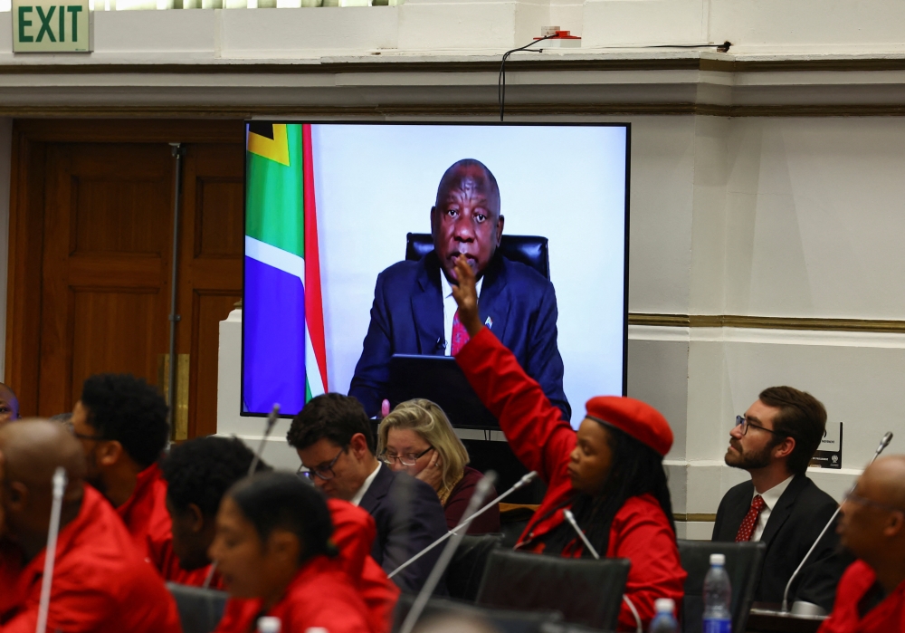 South African President Cyril Ramaphosa addresses the Parliament virtually, in Cape Town, South Africa, on August 30, 2022. REUTERS/Esa Alexander