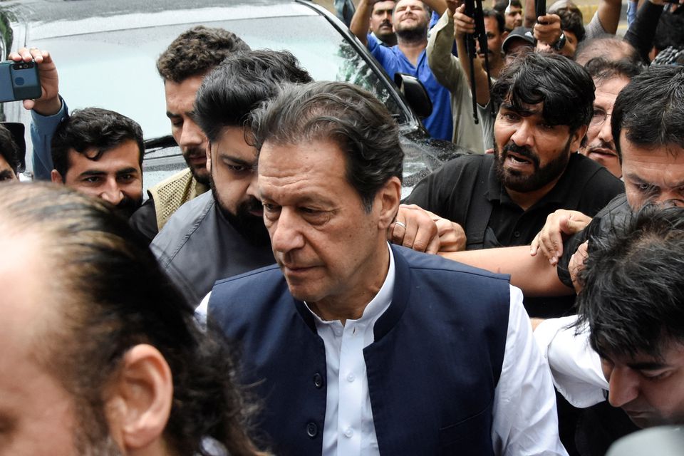 Pakistan's former Prime Minister Imran Khan, who is facing terrorism charges, appears in court to extend pre-arrest bail, in Islamabad, on August 25, 2022. REUTERS/Waseem Khan 