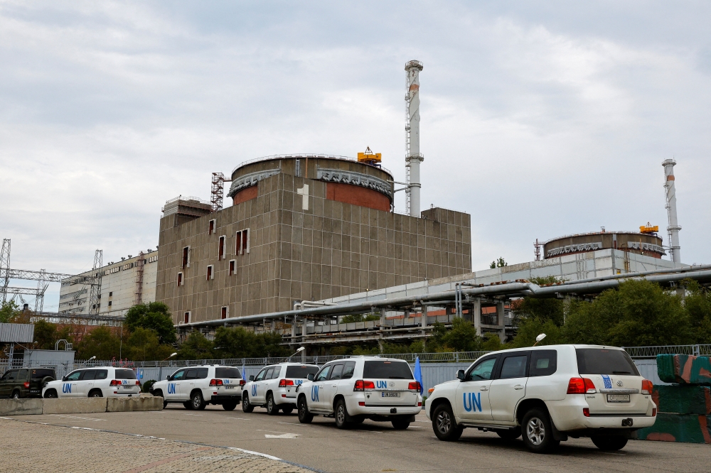 A motorcade transporting the International Atomic Energy Agency (IAEA) expert mission, escorted by the Russian military, arrives at the Zaporizhzhia Nuclear Power Plant outside Enerhodar in the Zaporizhzhia region, Ukraine, on September 1, 2022.  REUTERS/Alexander Ermochenko