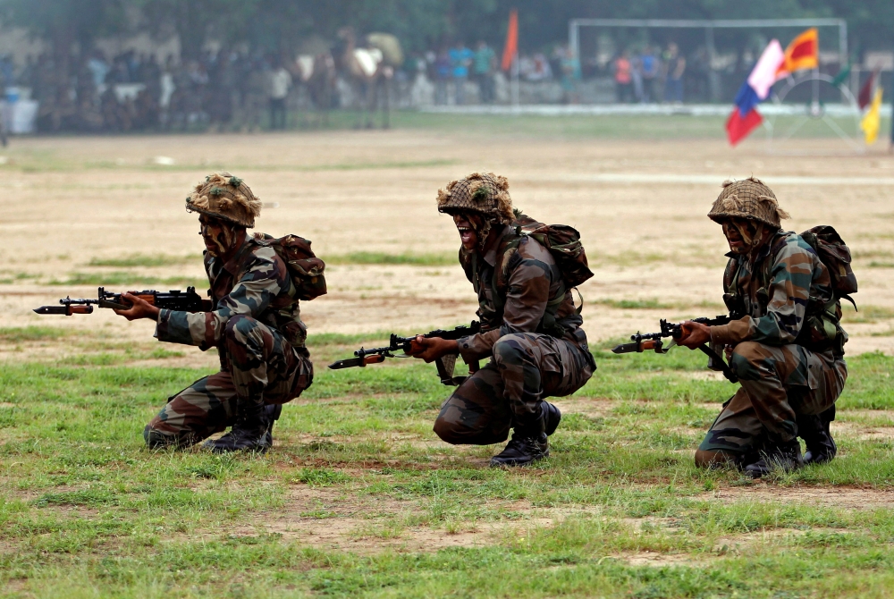  Indian Army soldiers participate in a war exercise during a two-day 