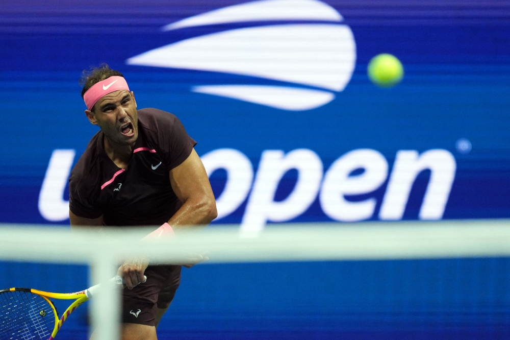 Rafael Nadal of Spain serves to Richard Gasquet of France on day six of the 2022 U.S. Open tennis tournament at USTA Billie Jean King Tennis Center. Mandatory Credit: Danielle Parhizkaran-USA TODAY Sports