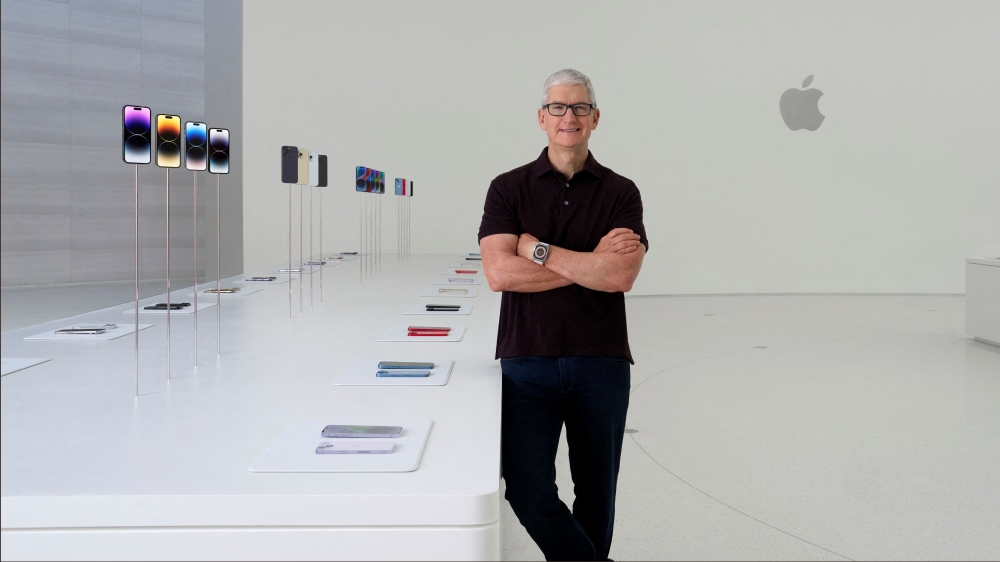 Apple's CEO Tim Cook poses for a special event at Apple Park in Cupertino, California, US in a photograph released September 7, 2022. Brooks Kraft/Apple Inc./Handout via REUTERS 