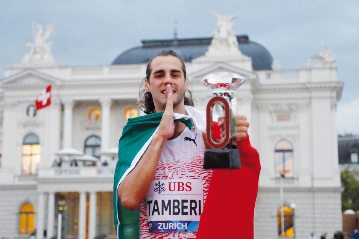 Italy’s Gianmarco Tamberi celebrates with the Diamond Trophy after winning the men’s high jump final in Zurich, yesterday.