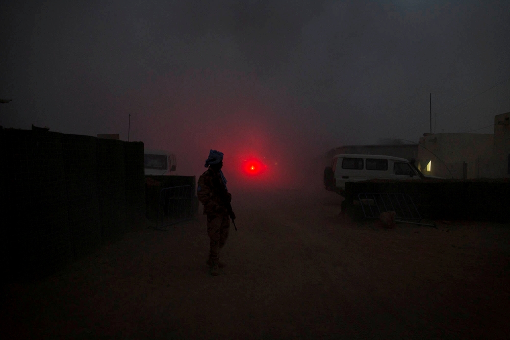 A United Nations peacekeeper secures the MINUSMA base after a mortar attack in Kidal, Mali, on June 8, 2017.  File Photo/ Reuters