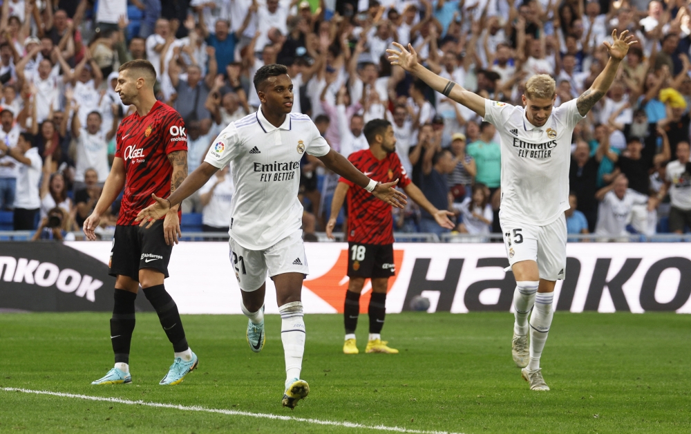 Real Madrid's Rodrygo celebrates scoring their third goal against RCD Mallorca at the Santiago Bernabeu in Madrid on September 11, 2022.  REUTERS/Susana Vera