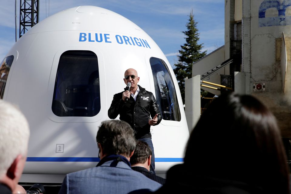 Amazon and Blue Origin founder Jeff Bezos addresses the media about the New Shepard rocket booster and Crew Capsule mockup at the 33rd Space Symposium in Colorado Springs, Colorado, on April 5, 2017. REUTERS/Isaiah J. Downing/File Photo