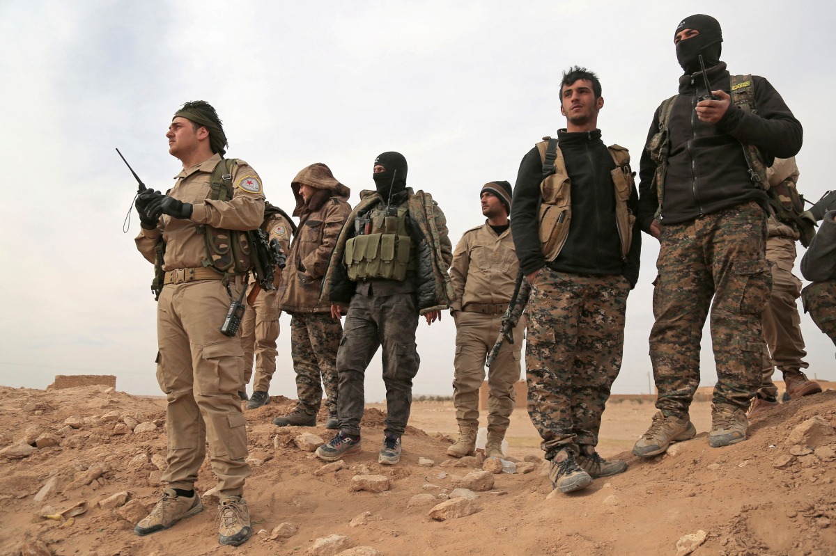 Syrian Democratic Forces (SDF) fighters gather during an offensive against Islamic State militants in northern Raqqa province, Syria, on February 8, 2017. File Photos / Reuters