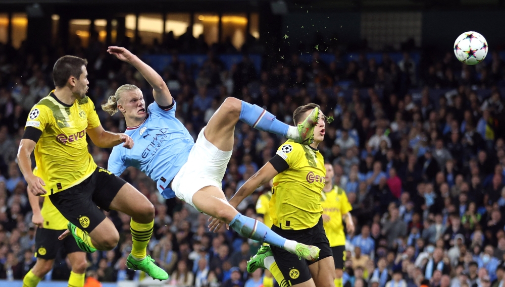 Manchester City's Erling Braut Haaland scores their second goal during the Group G Champions League match against Borussia Dortmund at the Etihad Stadium in Manchester on September 14, 2022.  Action Images via Reuters/Carl Recine