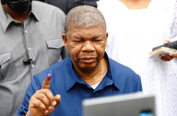 Angola's President and leader of the People's Movement for the Liberation of Angola (MPLA) ruling party, Joao Lourenco, gestures after castsing his vote in the general election in the capital Luanda, Angola, on August 24, 2022. REUTERS/Siphiwe Sibeko