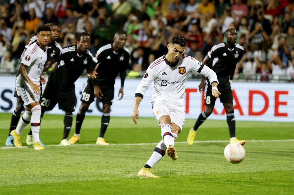 Manchester United's Cristiano Ronaldo scores their second goal from the penalty spot during the Europa League  Group E match against Sheriff Tiraspol at the Zimbru Stadium, Chisinau, Moldova on September 15, 2022.   Action Images via Reuters/Peter Cziborra