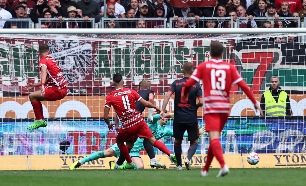 FC Augsburg's Mergim Berisha scores their goal during the German Bundesliga match against Bayern Munich at the WWK Arena, Augsburg, Germany, on September 17, 2022. 
REUTERS/Lukas Barth