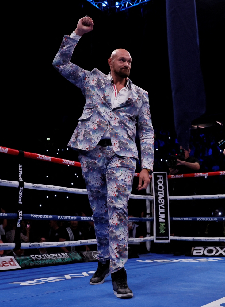 Tyson Fury acknowledges the crowd before the Joe Joyce vs Joseph Parker WBO Interim World Heavyweight Title fight at the  AO Arena, Manchester, Britain, on September 24, 2022.  Action Images via Reuters/Andrew Couldridge 