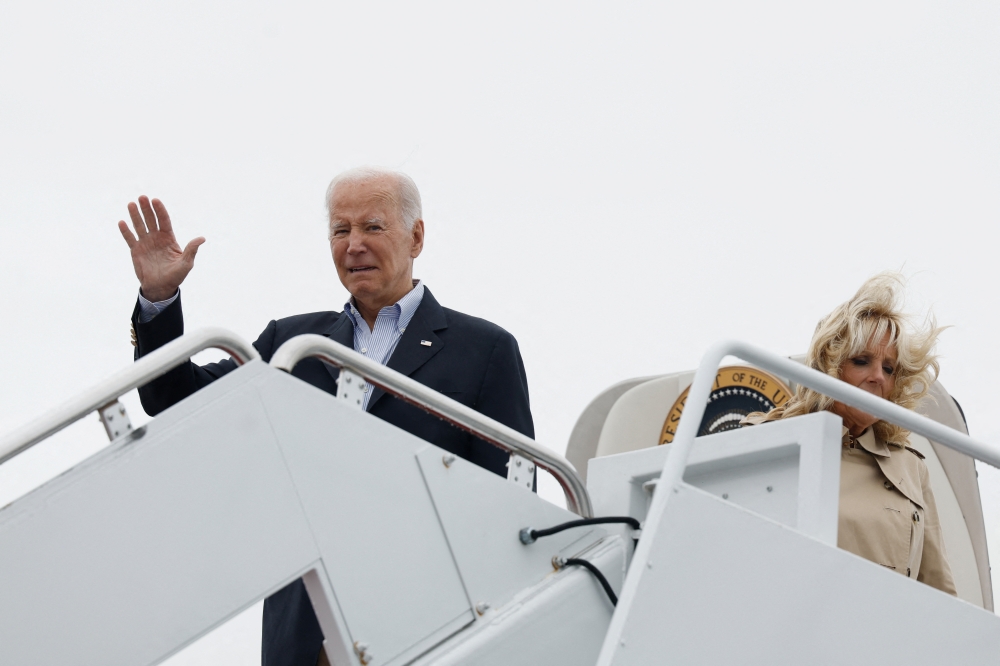 US President Joe Biden and First Lady Jill Biden depart Joint Base Andrews for Puerto Rico, in Maryland, US, October 3, 2022. (REUTERS/Evelyn Hockstein)

