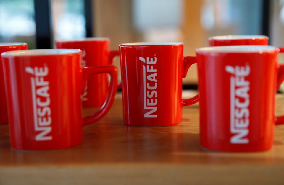 Nescafe mugs are pictured at Nestle Research Center in Orbe, Switzerland May 31, 2018. Picture taken May 31, 2018. REUTERS/Denis Balibouse/File Photo
