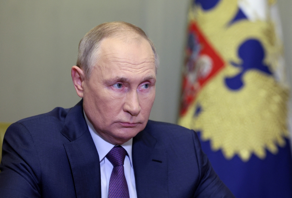 Russian President Vladimir Putin holds a meeting with Chairman of the Investigative Committee Alexander Bastrykin in Saint Petersburg, Russia, on October 9, 2022. (Sputnik/Gavriil Grigorov/Kremlin via REUTERS)