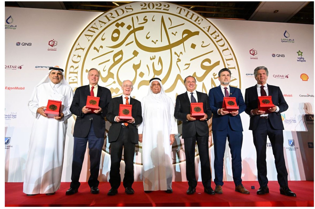 H E Abdullah bin Hamad Al Attiyah with the winners of this year's Al Attiyah International Lifetime Energy Awards, during the ceremony of honouring winners at the Sheraton Grand Doha Resort & Convention Hotel, yesterday. 