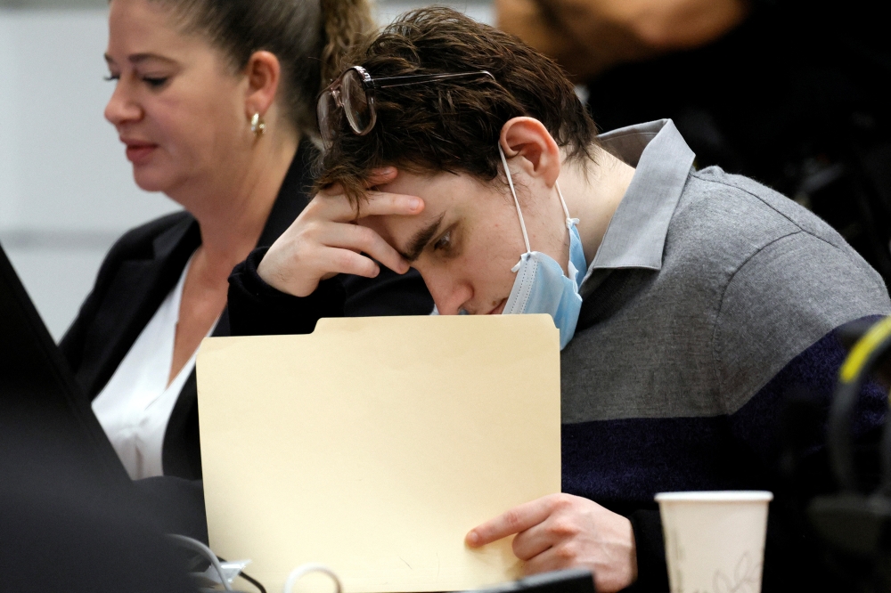 Marjory Stoneman Douglas High School shooter Nikolas Cruz sits at the defence table during a hearing just before the jury resumed deliberations in the penalty phase of his trial at the Broward County Courthouse in Fort Lauderdale, Florida, US, on October 13, 2022. Amy Beth Bennett/South Florida Sun Sentinel/Pool via REUTERS