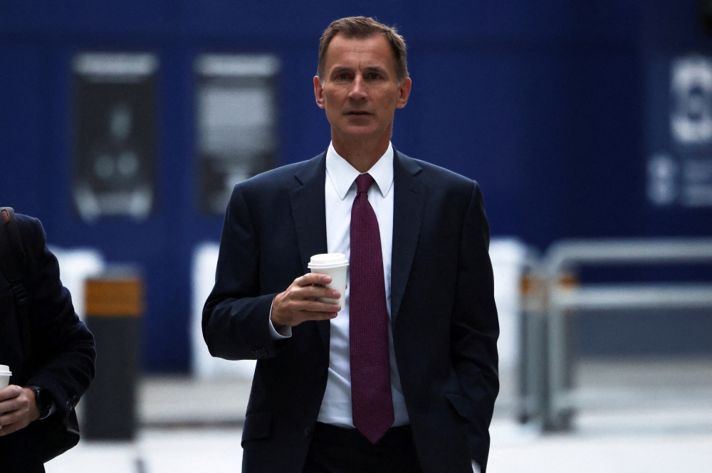 British Chancellor of the Exchequer Jeremy Hunt arrives at the BBC, in London, Britain, on October 15, 2022. REUTERS/Henry Nicholls/File Photo
 