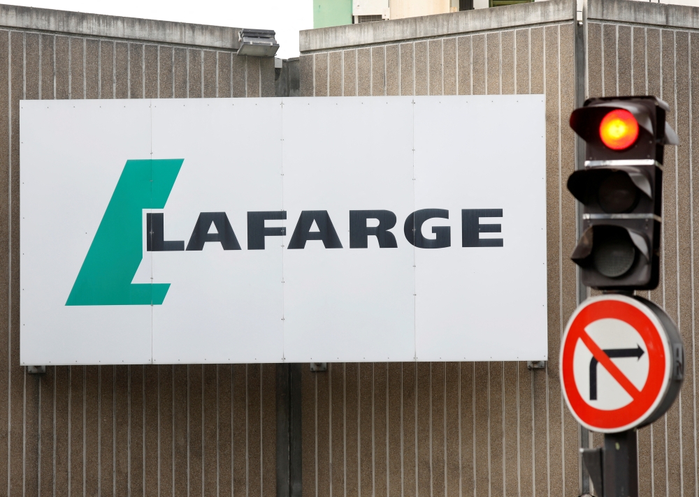 The logo of French concrete maker Lafarge is seen on the plant of Bercy on the banks of the river Seine in Paris, France, on September 3, 2020.  File Photo / Reuters
