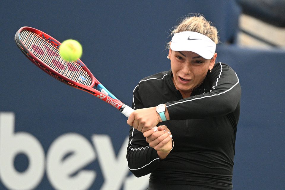 Aug 8, 2022; Toronto, ON, Canada; Donna Vekic (CRO) plays a shot against Simona Halep (ROU) in first round play in the National Bank Open at Sobeys Stadium. Mandatory Credit: Dan Hamilton
