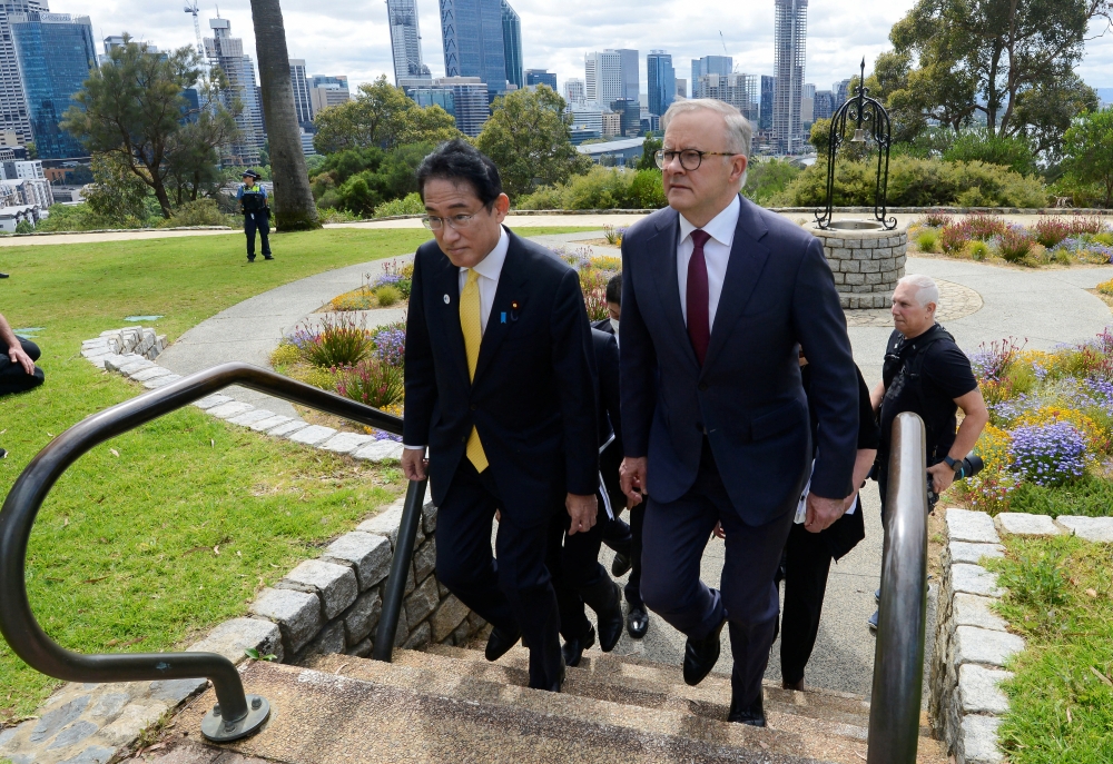 Australian Prime Minister Anthony Albanese greets Japanese Prime Minister Fumio Kishida in Perth city, Australia, on October 22, 2022. Sharon Smith/Pool via REUTERS